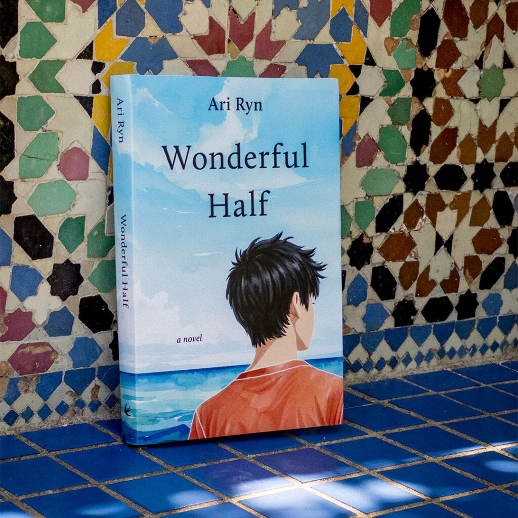 Photo of the paperback in the Moroccan garden in Osaka
